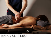 Releasing Tension an Expert's Touch Providing Back Massage Therapy. Стоковое фото, фотограф Aleksandr Golubev / Фотобанк Лори