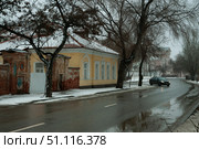 Зима, Астрахань, серый зимний день, слякоть, Набережная реки Кутум, дом Догадина ( памятник архитектуры ) (2021 год). Стоковое фото, фотограф Павел Просянов / Фотобанк Лори