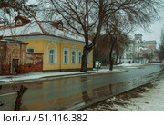 Зима, Астрахань, серый зимний день, слякоть, Набережная реки Кутум, дом Догадина ( памятник архитектуры ) (2021 год). Стоковое фото, фотограф Павел Просянов / Фотобанк Лори