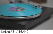 Blue Vinyl Record Spinning On Vintage Turntable. Needle Scratching Grooves Analog Sound. Стоковое видео, видеограф Степанов Григорий / Фотобанк Лори