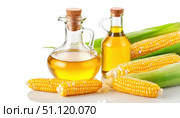 On a white background there are two glass bottles with golden oil and several ears of corn in green husks. Стоковое AI-изображение, AI-художник Светлана  Громак / Фотобанк Лори
