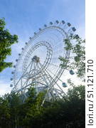 Sun of Moscow is the highest panoramic ferris wheel in Europe, against the blue sky on sunny summer day in in VDNKh park. view from below, copy space. Стоковое фото, фотограф Ирина Михайличенко / Фотобанк Лори