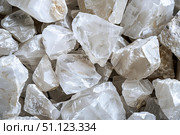 Petalite mineral specimens creating a textured background. Стоковое AI-изображение, AI-художник Иван Рябоконь / Фотобанк Лори
