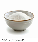 Bowl containing white granulated sugar on white background. Стоковое AI-изображение, AI-художник Иван Рябоконь / Фотобанк Лори