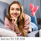 Portrait of a young woman lying on the sofa. Стоковое фото, фотограф Яков Филимонов / Фотобанк Лори