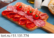 Coldcuts of Spanish cured jamon and sausages. Стоковое фото, фотограф Яков Филимонов / Фотобанк Лори