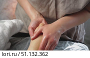 Natural medicine, reflexology, woman receiving foot massage, oppresses energy flow points, spa center. Стоковое видео, видеограф Владислав Тригуб / Фотобанк Лори