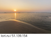 Sunset on Mandrem beach in Goa, India. (2018 год). Стоковое фото, фотограф Емельянов Евгений Викторович / Фотобанк Лори