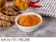 Indian tumeric cumin dry powder. Стоковое фото, фотограф Андрей Старостин / Фотобанк Лори