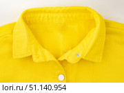 denim shirt made of yellow fabric with fringe, clothing details, collar, closure. Стоковое фото, фотограф ~✿Eлена Челышева(Кочина)✿~ / Фотобанк Лори