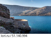 Spinalonga fortress on a clear sunny day. The ruins of leprosolium. (2019 год). Стоковое фото, фотограф Емельянов Евгений Викторович / Фотобанк Лори