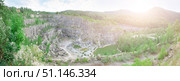 Panoramic photography of an open pit development, top view. Quarry mining of minerals and minerals, mines and industry. Стоковое фото, фотограф Наталия Кирсанова / Фотобанк Лори