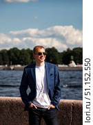 Posing in Saint Petersburg at Waterside on Clear Afternoon. Стоковое фото, фотограф Aleksandr Golubev / Фотобанк Лори