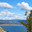 Summer landscape of Baikal Lake on sunny August day. View of Small Sea from Olkhon island coast. Ogoy island on the distanse. Natural background. Summer travels and outdoor recreation. Стоковое фото, фотограф Виктория Катьянова / Фотобанк Лори