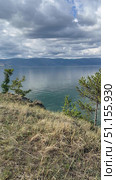 Vertical panoramic video of summer landscape of Baikal Lake on sunny day. View of Small Sea from Olkhon island coast. Natural background. Summer travels and outdoor recreation. Стоковое видео, видеограф Виктория Катьянова / Фотобанк Лори