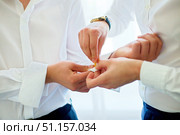 Men's hands correct shirt with cufflinks. Стоковое фото, фотограф Наталия Кирсанова / Фотобанк Лори