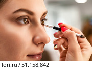 Beauty Transformation Unfolds as a Woman Enjoys Her Salon Experience With a Skilled Make-Up Artist. Стоковое фото, фотограф Aleksandr Golubev / Фотобанк Лори