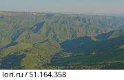 4k, A panoramic aerial view of the Two Monks rock on the Bolshoy Bermamyt plateau, North Caucasus, without people, at daytime, Stavropol Krai, Russia. Стоковое видео, видеограф Сергей Богомяко / Фотобанк Лори