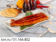 Smoked unagi eel in sause. Стоковое фото, фотограф Андрей Старостин / Фотобанк Лори