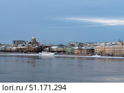 Embankment of Lieutenant Schmidt and the Church of the Assumption of the Blessed Virgin Mary (Assumption Church) on the banks of the Neva River on a winter day, Saint Petersburg, Russia. Стоковое фото, фотограф Ula Ulachka / Фотобанк Лори
