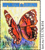 Saint Petersburg, Russia - November 12, 2020: Stamp issued in the Burundi with the image of the butterfly Precis octavia. From the series on Flowers and Butterflies, circa 1973. Стоковое фото, фотограф Константин Тимофеев / Фотобанк Лори
