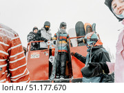 Sheregesh, Russia, 4 January 2021, Snowboarder skier getting out of snowcat. Редакционное фото, фотограф Spirit River / Фотобанк Лори