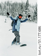 Sheregesh, Russia, 4 January 2021, Snowboarder skier sliding down snowy slope. Редакционное фото, фотограф Spirit River / Фотобанк Лори