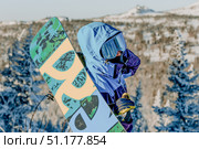Sheregesh, Russia, 5 January 2021, Snowboarder skier stand front mountain resort. Редакционное фото, фотограф Spirit River / Фотобанк Лори