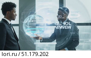 Business professionals engage in a discussion about cutting-edge technology while showcasing a digital globe in a contemporary office. Стоковое AI-видео, аниматор Данила Большаков / Фотобанк Лори