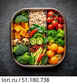 A Healthy and Colorful Bento Box Filled With Vegetables, Grains, and Fruit Ready for a Lunch Break. Generative AI. Стоковое AI-изображение, AI-художник Roman Zavorotny / Фотобанк Лори