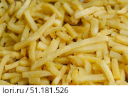 Golden french fries background. Fast food. Стоковое фото, фотограф Маргарита Кирьякова / Фотобанк Лори