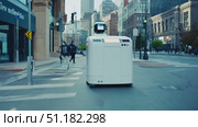 An autonomous delivery robot moves through busy city streets, showcasing modern technology in urban logistics and everyday life. Стоковое AI-видео, аниматор Данила Большаков / Фотобанк Лори