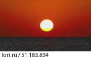 Sun over sea sunrise. Стоковое видео, видеограф Михаил Коханчиков / Фотобанк Лори
