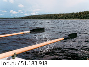 Karelia, Russia, 9 June 2019, Tourists sail on wooden paddle boat on Lake Ladoga. Стоковое фото, фотограф Spirit River / Фотобанк Лори