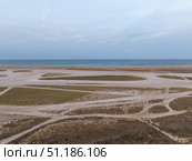 Salt marshes meeting the sea in Leucate, France, at dawn. Стоковое фото, фотограф Данил Руденко / Фотобанк Лори
