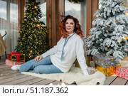 Woman Christmas Tree Decorated Porch. Стоковое фото, фотограф svetograph / Фотобанк Лори