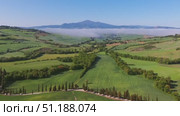 Tuscany aerial landscape at morning in Italy (2023 год). Стоковое видео, видеограф Михаил Коханчиков / Фотобанк Лори