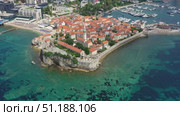 Aerial view of old town of Budva (2023 год). Стоковое видео, видеограф Михаил Коханчиков / Фотобанк Лори