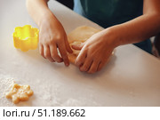 Creating Sweet Memories: A Family Method for Cookie Making. Стоковое фото, фотограф Aleksandr Golubev / Фотобанк Лори