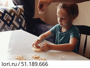 Family Gathers in Cozy Kitchen for Joyful Cookie Making Experience With Loved Ones. Стоковое фото, фотограф Aleksandr Golubev / Фотобанк Лори