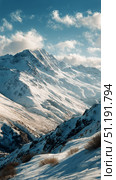 Beautiful Snowy Mountain Landscape Under a Clear Blue Sky With Clouds Hovering in the Background. Стоковое AI-изображение, AI-художник Юлия Гапеенко / Фотобанк Лори