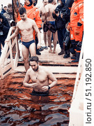 Saint Petersburg, Russia, 19 January 2022, People dip font on Orthodox Epiphany. Редакционное фото, фотограф Spirit River / Фотобанк Лори