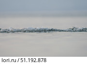 Delicate water ripples generating soft bubbles, reflecting serene ocean surface with gentle luminosity. Стоковое фото, фотограф Данил Руденко / Фотобанк Лори