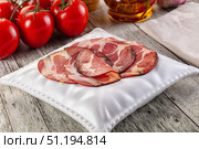 Italian Cured pork neck slices. Стоковое фото, фотограф Андрей Старостин / Фотобанк Лори