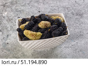 Ripe sweet juicy black and white mullberry. Стоковое фото, фотограф Андрей Старостин / Фотобанк Лори