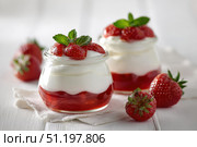 Fresh Berry Trifle in Glasses. Dessert with Strawberry and Whipped Cream. Layered Yogurt with Berry Fruits. Berry Pudding Glass Jars. Food Marketing, Recipe Design. Colorful Sweet Treat. Fruity Quark. Стоковое AI-изображение, AI-художник Марина Демидюк / Фотобанк Лори