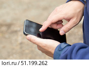 Phone fraud.Talking to phone scammers. Withdrawal of money via the Internet. Стоковое фото, фотограф Александр Поташев / Фотобанк Лори