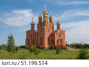 Собор Успения Пресвятой Богородицы в Ачаирском монастыре Креста Господня солнечным августовским днем. Омская область. Стоковое фото, фотограф Виктор Карасев / Фотобанк Лори