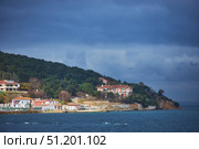 ISTANBUL, TURKEY - NOVEMBER 26, 2021: Building on the Princes' Islands, view from the ship. The Sea of Marmara. Редакционное фото, фотограф Наталия Кирсанова / Фотобанк Лори
