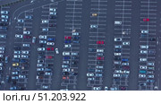 Top view on mall parking with cars. Стоковое видео, видеограф Михаил Коханчиков / Фотобанк Лори